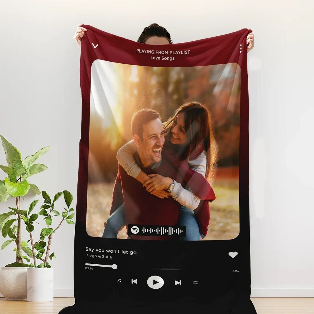 Custom photo blanket showing a couple hugging with a music player design.