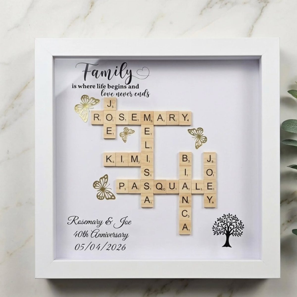 Personalized wooden tile crossword anniversary gift in a white frame with gold butterflies