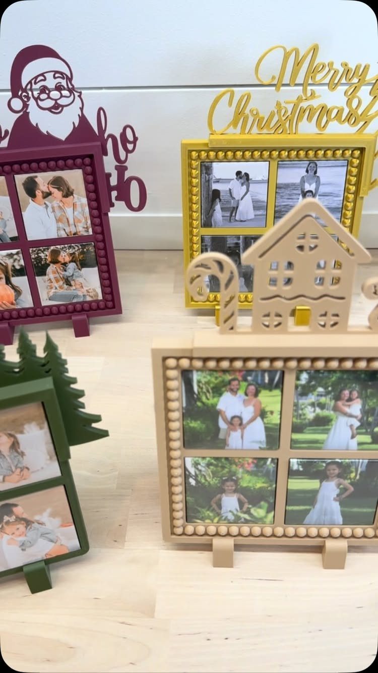 Christmas-themed photo frames with couple and family pictures on a wooden surface