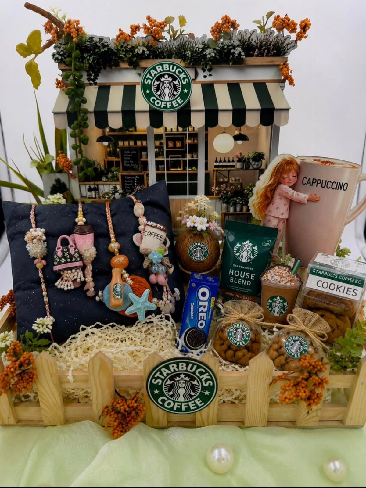 19 Coffee Fan Gifts for Every Budget and Brew Style 6 Coffee-themed gift basket with miniature Starbucks shop, coffee beans, cookies, and beaded jewelry.