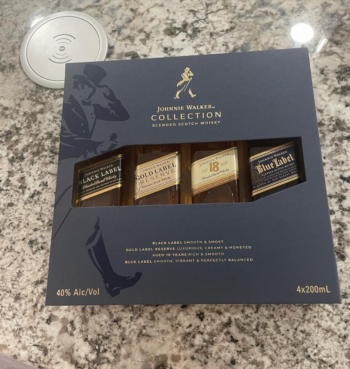 Johnnie Walker Collection gift set with four miniature scotch whisky bottles in blue box
