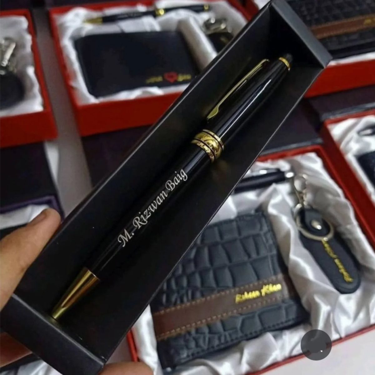 Custom Engraved Gifts: 10 Ideas for Every Occasion 4 Engraved black and gold pen in a box with matching corporate gift sets.