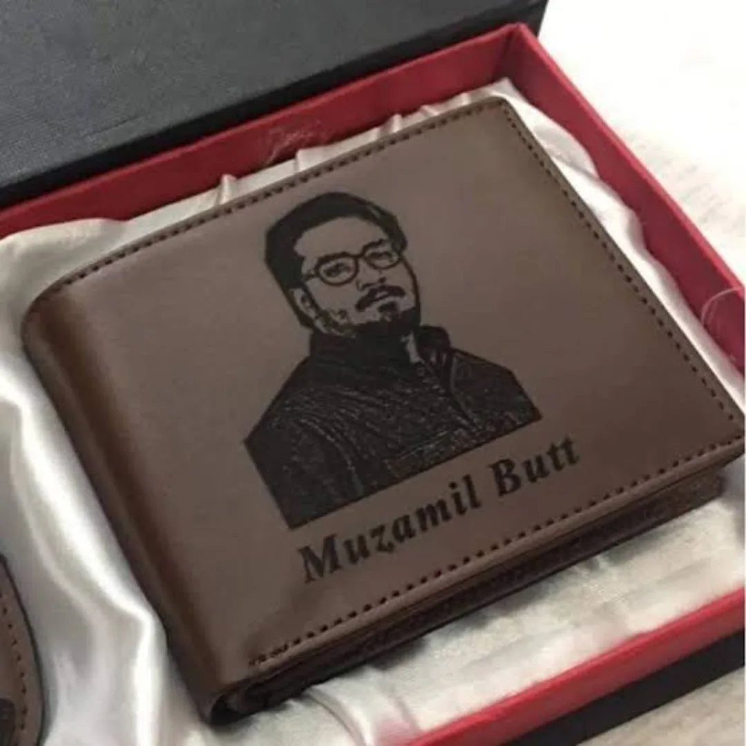 Custom Engraved Gifts: 10 Ideas for Every Occasion 3 Brown leather wallet with engraved portrait and name inside a red gift box.