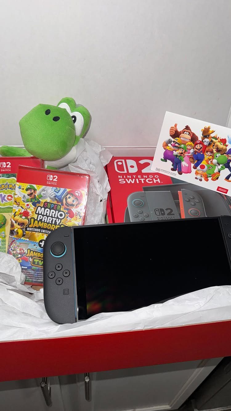 Nintendo Switch console and Mario Party game with a Yoshi plush toy gift set