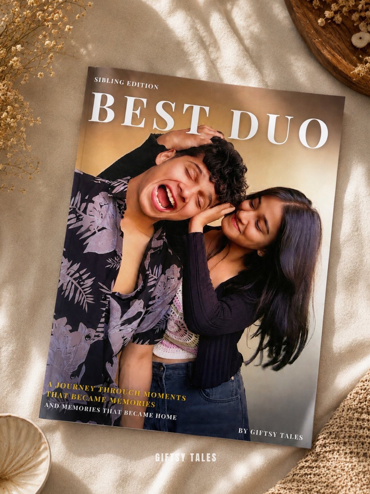 22 Gift Ideas for Brother, From Hoodies to Gadgets 10 Personalized photo book titled Best Duo featuring a laughing couple on the cover.