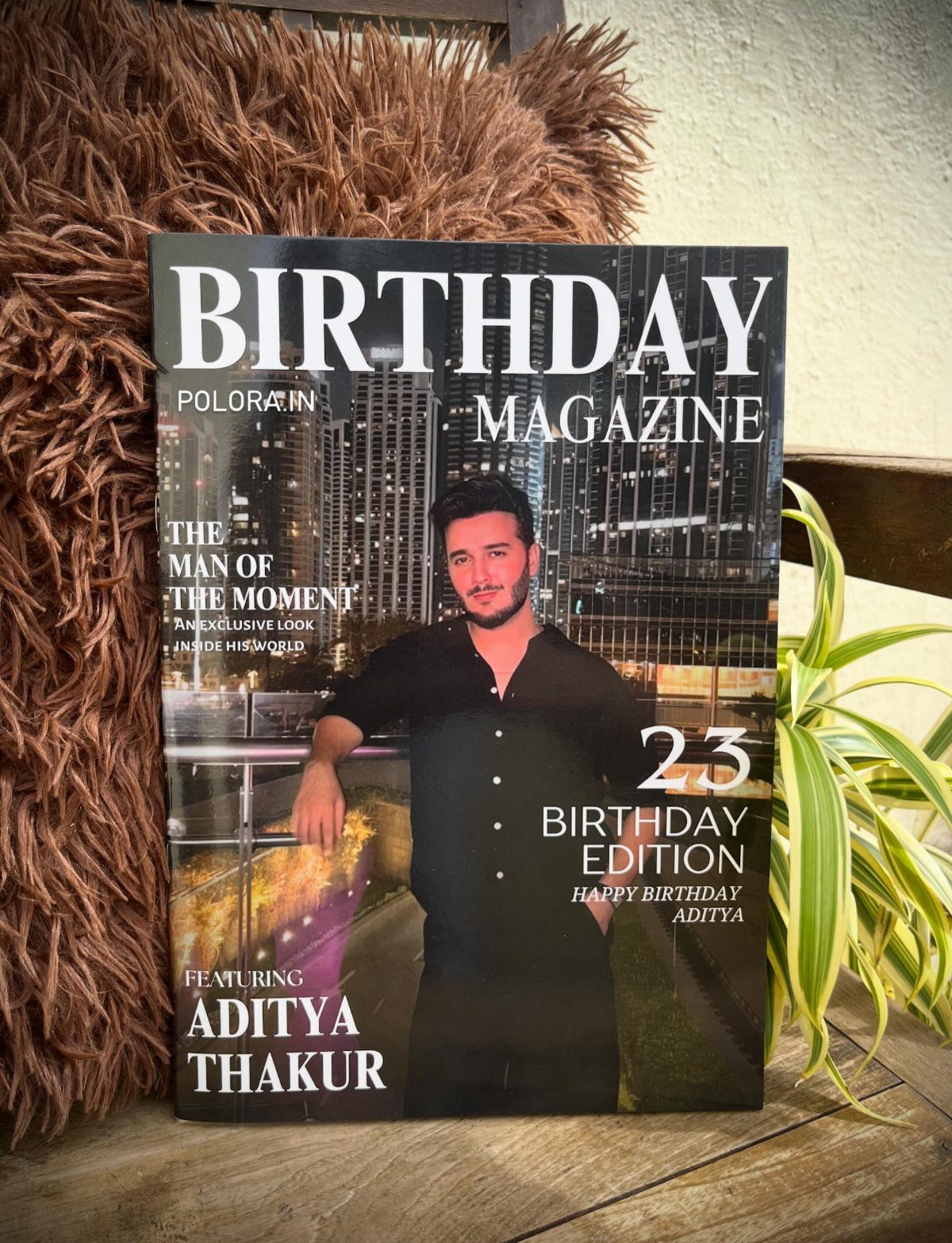Personalized birthday magazine cover featuring a man posing against a night city skyline.