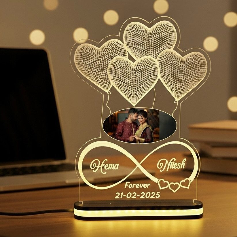 Personalized infinity light lamp with couple's photo, names, and heart-shaped balloon etchings.