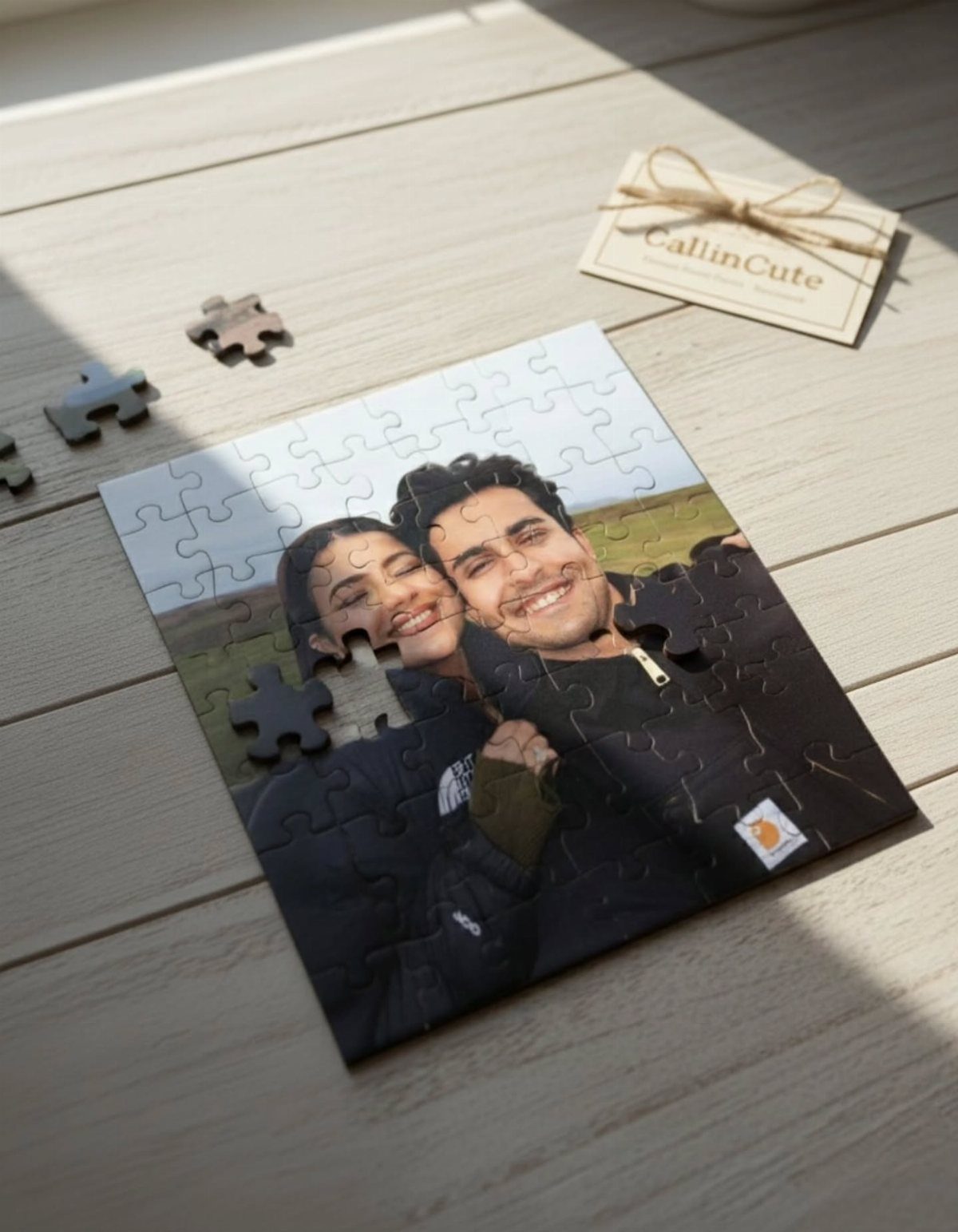 Custom photo jigsaw puzzle of a smiling couple on a light wooden floor.