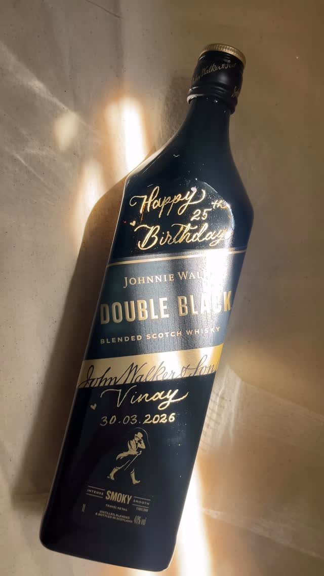20 Ideal Boyfriend Gifts He'll Actually Use and Keep 14 Customized Johnnie Walker Double Black whisky bottle with gold birthday lettering for Vinay