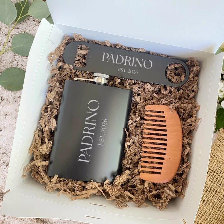 Matte black engraved flask, bottle opener, and wooden comb in a gift box