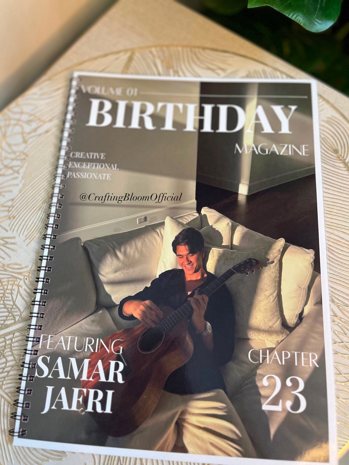 Spiral-bound personalized birthday magazine featuring a man playing guitar on the cover.