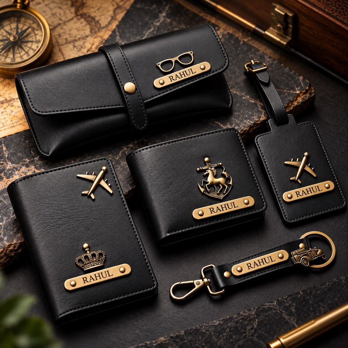 Black leather travel set with gold nameplates including a personalized luggage tag.