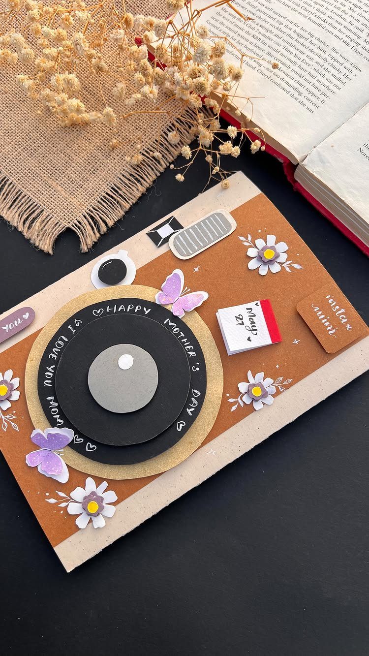 Handmade Mother's Day card shaped like a record player with floral decorations.