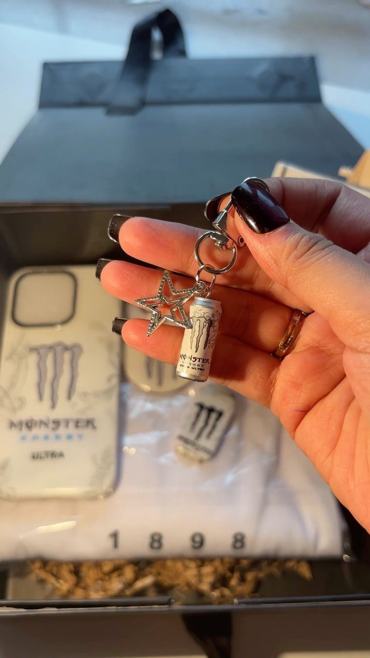 National Boyfriend Day Gifts: 12 Ideas for Him 10 Hand holding a Monster Energy keychain over a themed gift box set