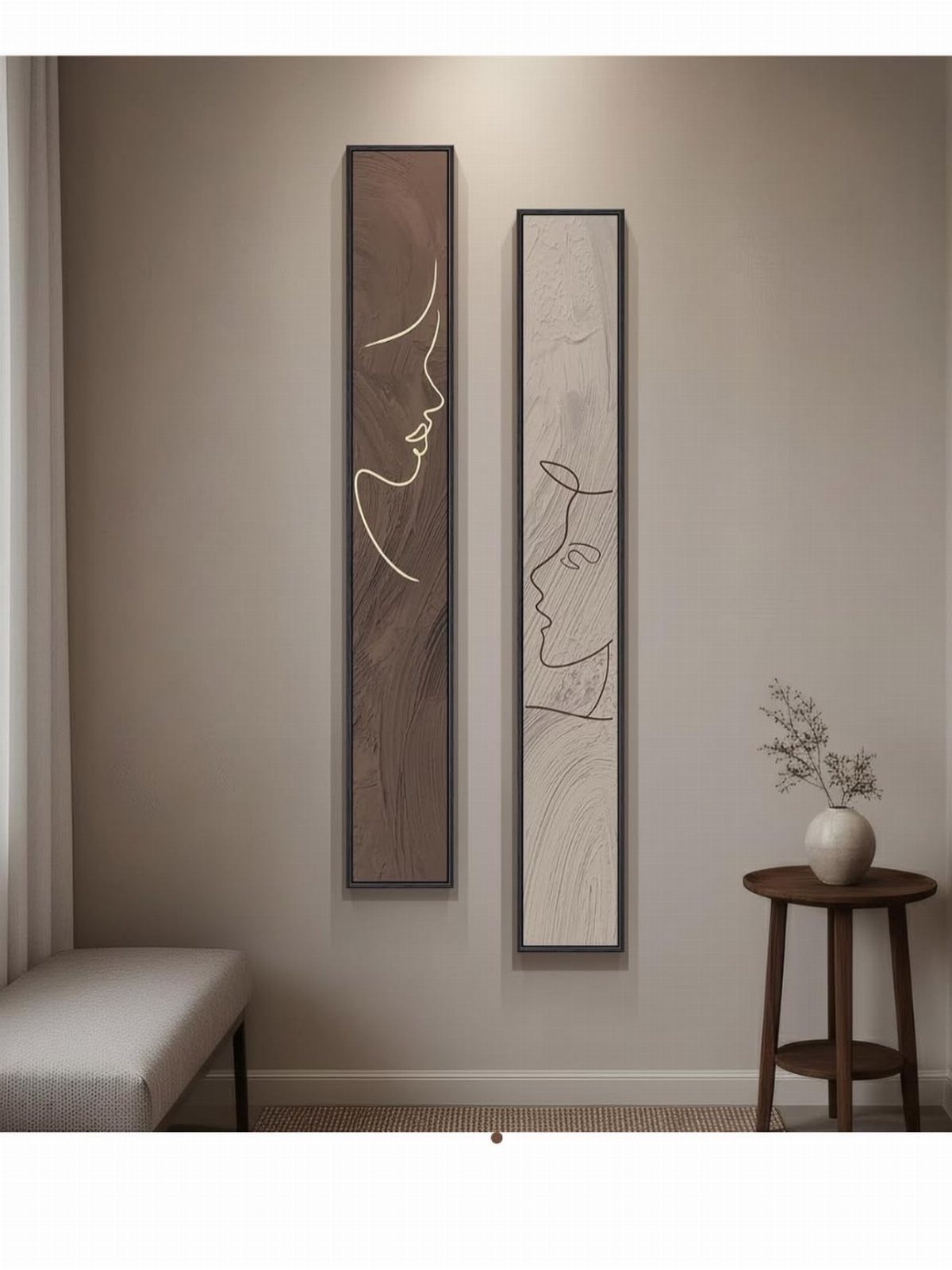 12 Paintings as Gifts for Every Budget and Taste 4 Two minimalist line art paintings of faces hanging on a neutral beige wall.