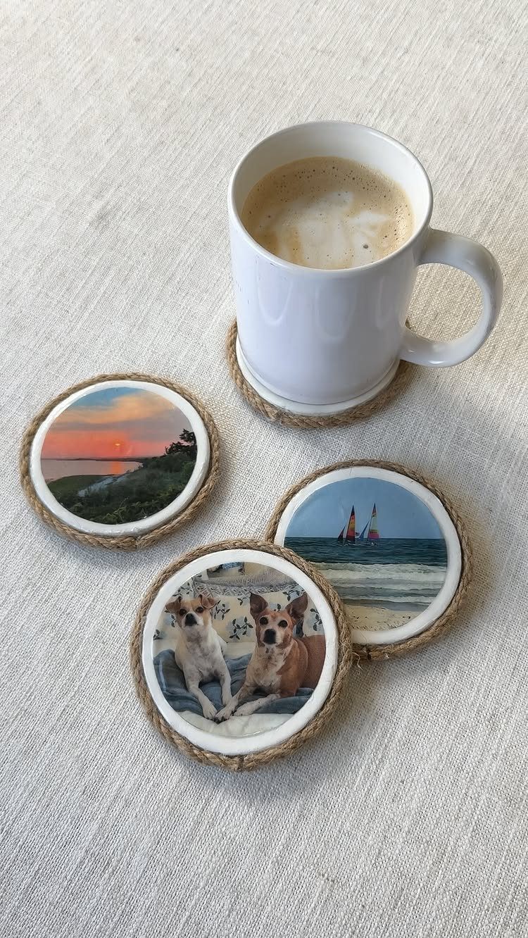 Round rope-edged coasters with personal photos and a white coffee mug.