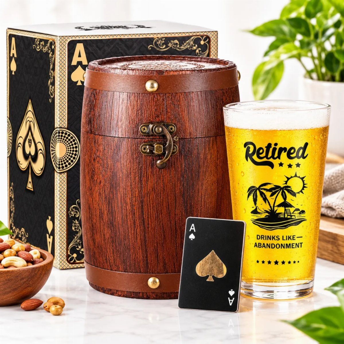Retired beer glass, wooden barrel container, and playing cards on a marble table.