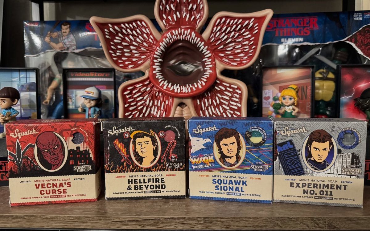 Four Dr. Squatch Stranger Things soap boxes in front of a Demogorgon planter.