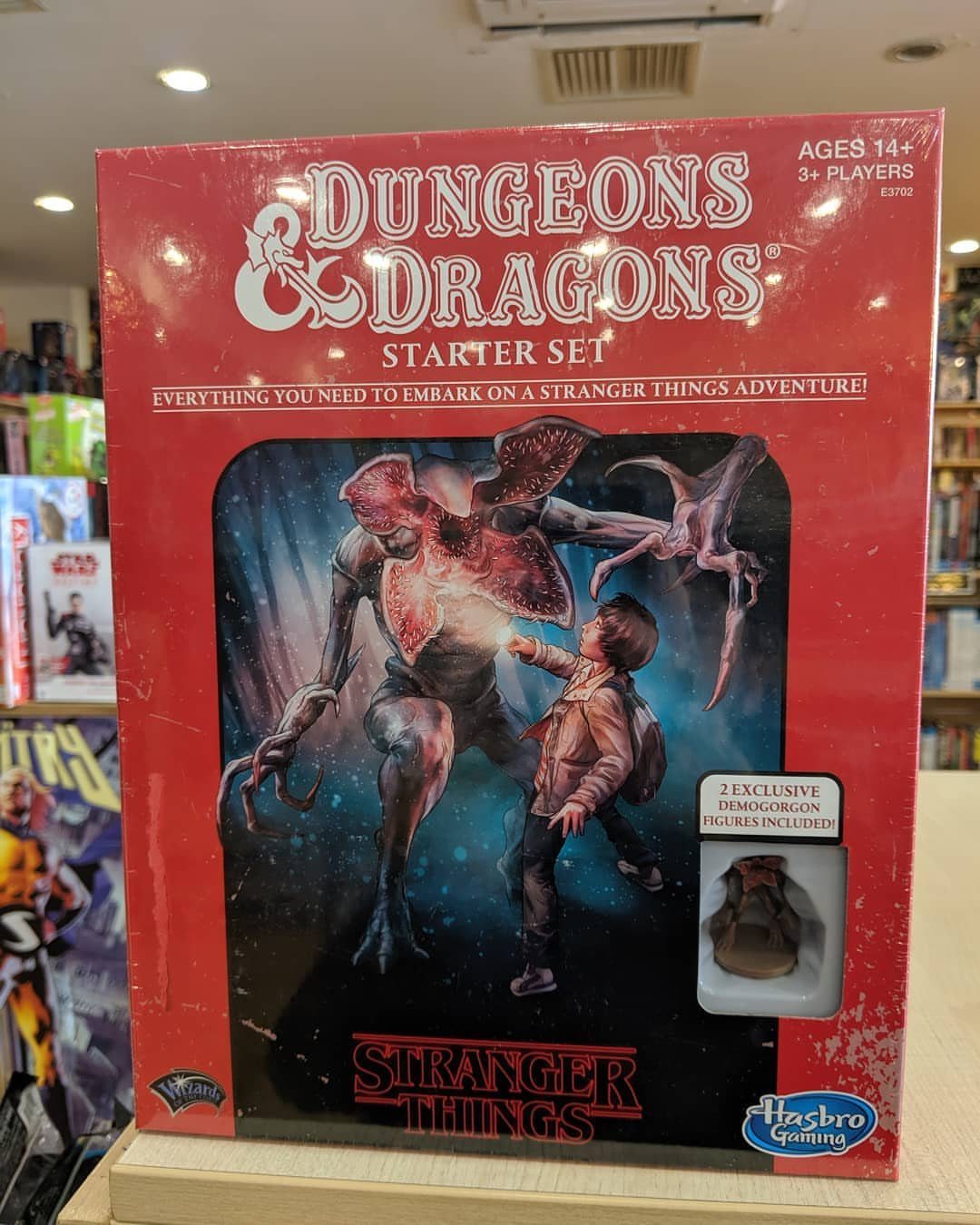 Dungeons & Dragons Stranger Things Starter Set box with Demogorgon figure and artwork.