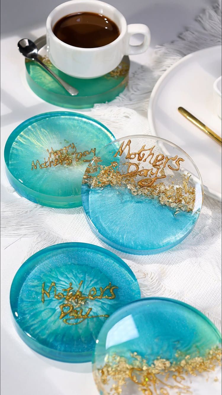 Turquoise and blue resin coasters with gold foil and Mother's Day text.
