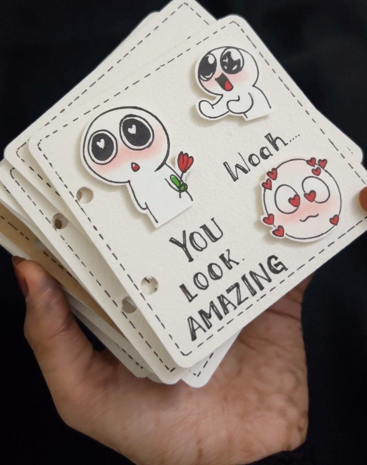 Handmade white cards with cute cartoon characters and the text You Look Amazing.