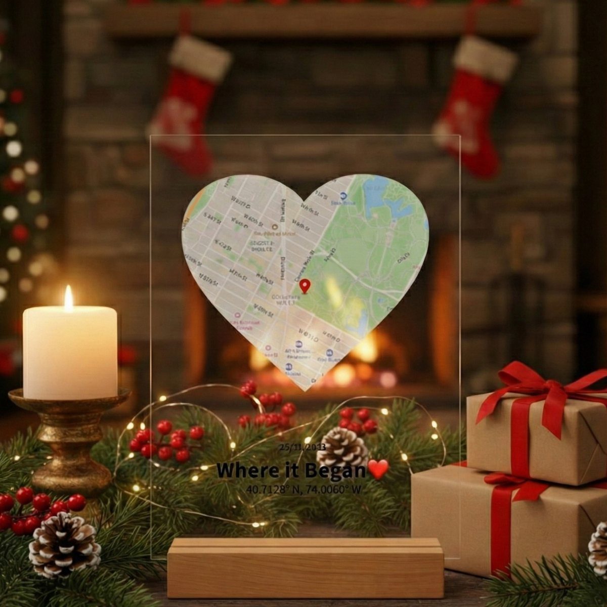 Heart-shaped acrylic map plaque with location pin on a wooden base near gifts.