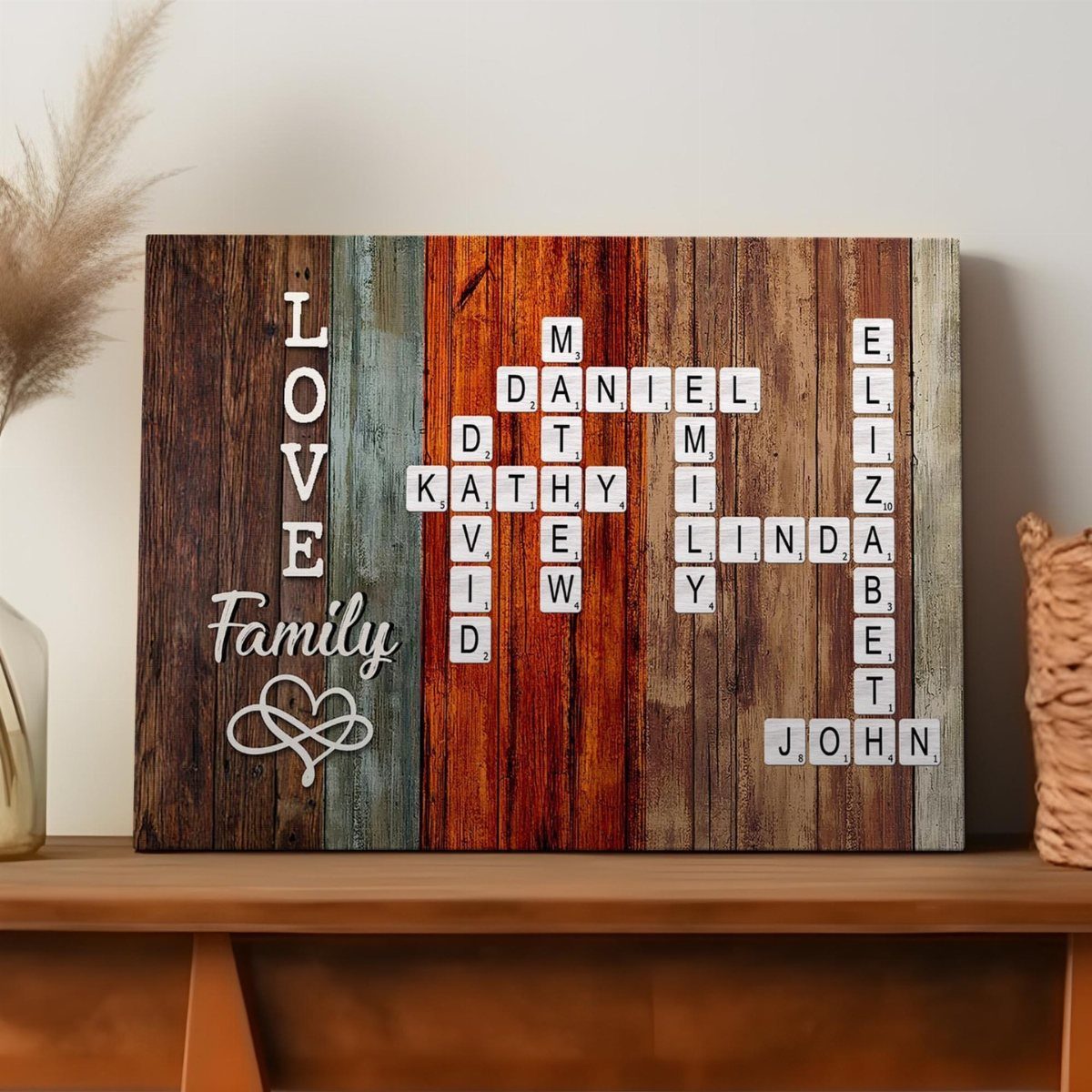 Wooden family crossword sign with colorful planks and white letter tiles on a table