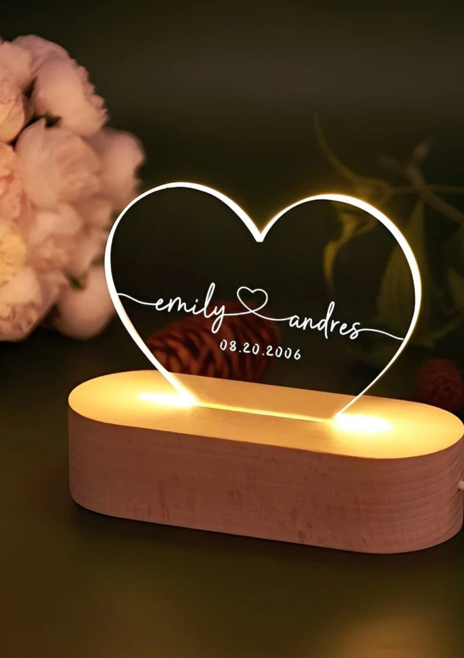 Heart-shaped acrylic LED lamp with engraved names and date on wooden base