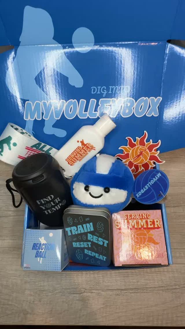 Volleyball-themed subscription box filled with sports accessories and gear in a blue box.